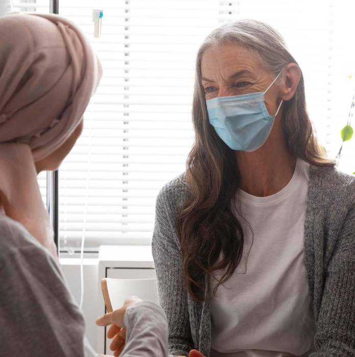 Patient Ressource Parcours Deux personnes (dont une malade) dialoguant